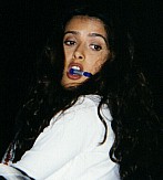 Salma with a pen in her mouth